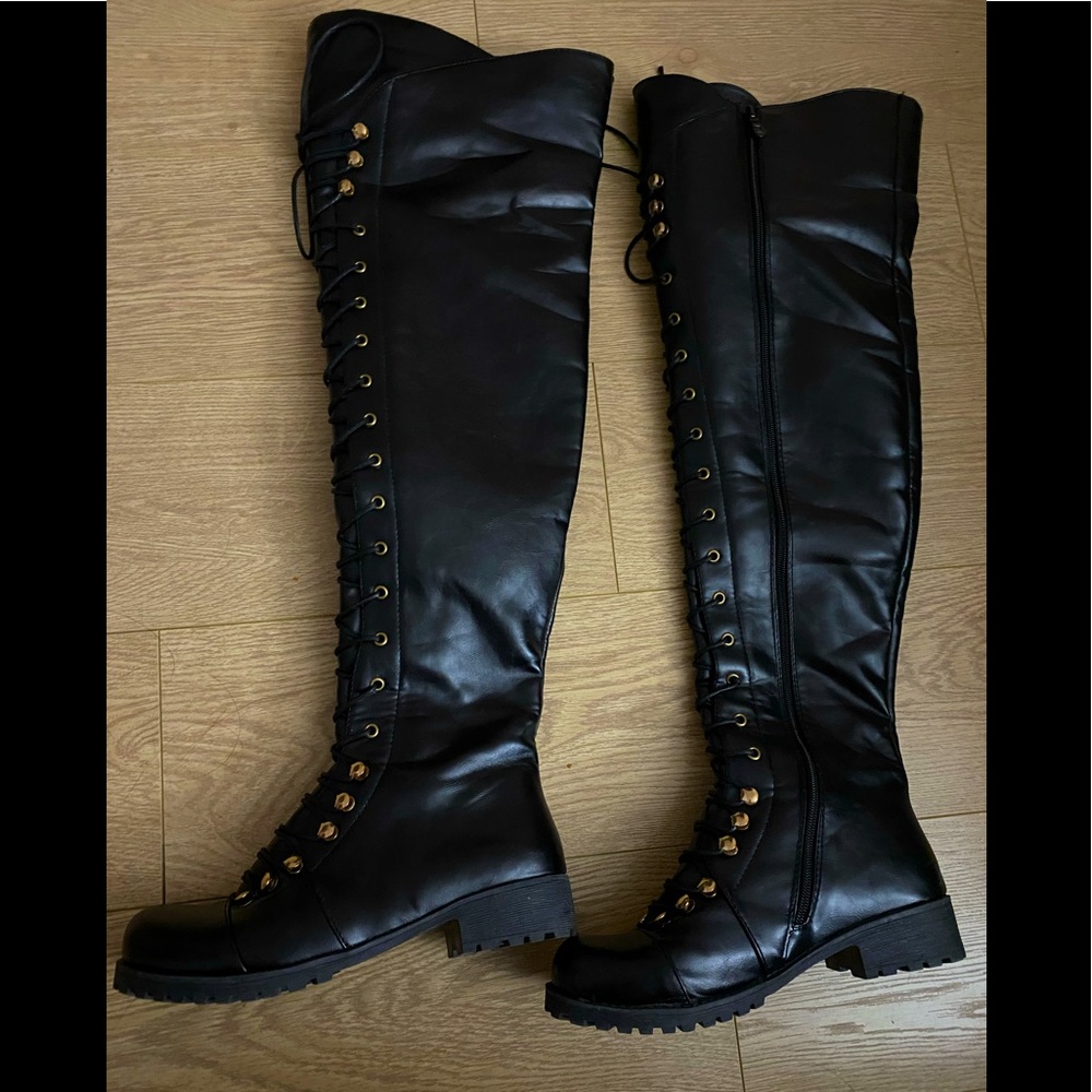 Thigh high black boots